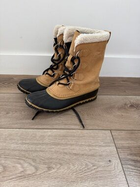 Sorel Tan and Black Sherpa-Lined women’s Winter Boots